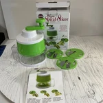 Norpro White Green Triple Spiral Slicer With 3 Blades Medium. Fixed Price $29.99.