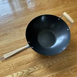 Imusa Steel Non-stick Wok Double Wooden Handles. Fixed Price $15.00.
