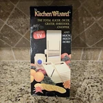 Kitchen Wizard, The Total Slicer, Dicer, Grater, Shredder, Chopper. Fixed Price $15.00.