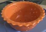 Chantal 4 Cup Colander Orange Ceramic Starburst Christmas Pasta. Fixed Price $10.95.