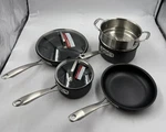 Cuisinart New Pot And Pans Set W/ Lids Induction Hard Anodozied Non Stick. Fixed Price $187.23.