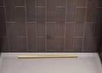 Delta 24" Linear Shower Drain Champagne Bronze Wall Edge DT0732470-CZ. Fixed Price $85.00.