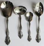 Oneida Stainless Steel 4 Piece Flatware, Ladles & Serving Spoon Strainer. Fixed Price $26.00.