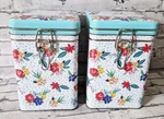 Pioneer Way Celebrate Floral Square Lock Top Metal Tin Canister Set Of 2. Fixed Price $45.00.