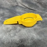 Vtg Tupperware Egg Separator #779-10 Yellow. Fixed Price $9.99.