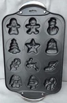 Norpro Nonstick Holiday Cookie Pan #3978 12 Designs Stainless Handles. Fixed Price $25.00.