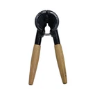 Vintage Spring Action Wood Handle Black Metal Walnut Tool. Fixed Price $21.24.
