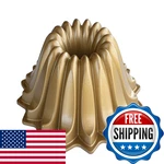 Nordic Ware Lotus Bundt Pan Gold 5 Cup Capacity 84177. Fixed Price $58.19.