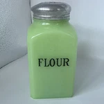 Jeanette Jadeite Glass Art Deco Flour Shaker With Lid. Fixed Price $100.00.