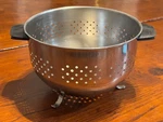 Vintage Farberware Stainless Steel Colander Strainer Black Handles Footed 9X6. Fixed Price $34.90.