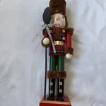 15" Nutcracker Figurine, Wood King Soldier Holding Scepter With Bow. Fixed Price $17.00.