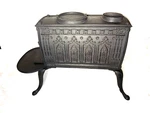 Fancy Cast Iron Cathedral Motif Stove Granger & Brothers Pittsford. Fixed Price $695.00.