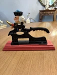 Vintage Cast Iron Wood Base Nut Cracker Hand Painted Soldier. Fixed Price $13.49.