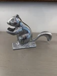 Squirrel Mechanical Cast Aluminum Silver Color Figural. Fixed Price $19.00.