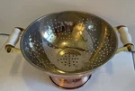 Vintage Copper Plated Colander With Brass & Porcelain Handles Made Korea 9". Fixed Price $25.00.