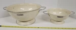Set Of 2 Befare Beige Enamel Metal Colanders W/pedestal Base & Side Handles. Fixed Price $30.00.