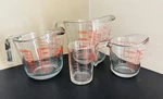 Set Of 4 Anchor Hocking Glass Measuring Cups - Cup, 2 5OZ. Fixed Price $30.00.