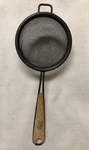 Genia Strainer Extra Strong West Germany Metal Wood Handle 7" Antique. Fixed Price $21.00.