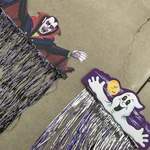 Lot Of 2 Vtg Fun World Foil Kooky Door Curtains Ghost & Vampire Halloween Decor. Fixed Price $35.00.