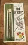 Travco Nos Sealed Vintage Steel Handheld Nut Cracker With 2 Picks. Fixed Price $15.00.