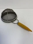 Vintage Mcm Yellow Bakelite Stainless Steel Hand Strainer D4-53. Fixed Price $26.00.
