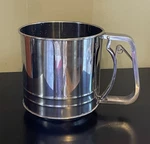 Triple Mesh Stainless Steel Flour Sifter - 5 Cup. Fixed Price $10.95.