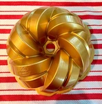 Nordic Ware 75TH Anniversary Braided Bundt Pan. Fixed Price $34.50.